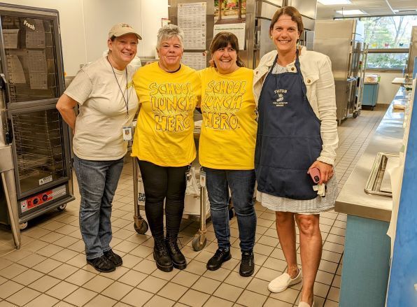 Kitchen staff posing for photo
